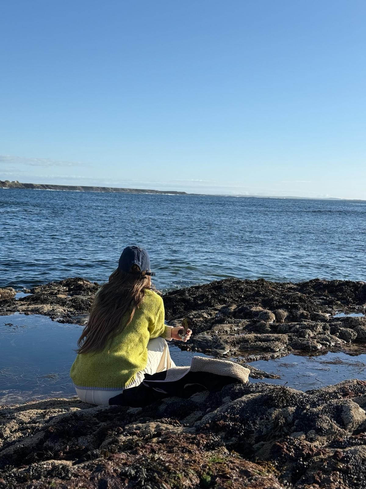 Aoife Mc Namara wearing her Wild Meadows Green AMN Jumper in County Clare 